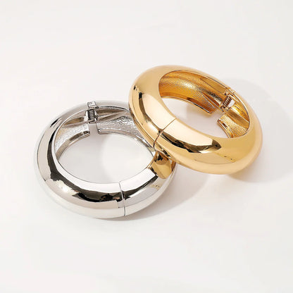 Bold Sculptural Spring Bangle