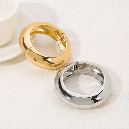 Bold Sculptural Spring Bangle