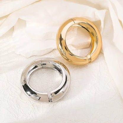 Bold Sculptural Spring Bangle