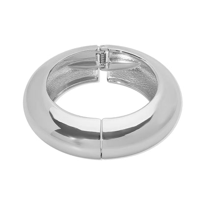 Bold Sculptural Spring Bangle